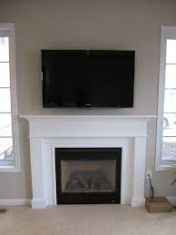 Furniture Fireplace Designs With Tv Above Living Room Fireplace Tv Arrange Flat Screen Tv Over F Tv Mounted Above Fireplace Living Room Tv Family Room Design