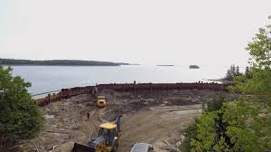 Rick takes a look at a surprising structure uncovered at Smith's Cove. |  The Curse of Oak Island | Facebook