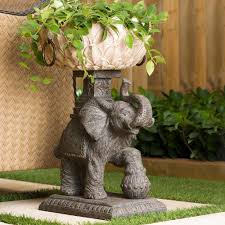 20 years designing indoor & outdoor home & garden accents. Bombay Outdoors Assam Elephant 15 25 In W X 23 75 In H Resin Planter A004042 999a The Home Depot Elephant Planters Elephant Home Decor Urn Planters