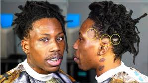 his BABYMOMMA ripped out his DREADS! i finished what she started...