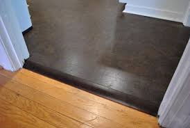 How To Add Floor Trim Transitions And Reducers Young House Love Flooring Transition Flooring Cork Flooring