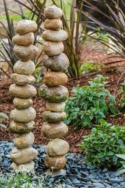 14 Marvelous Garden Decorating Ideas With Rocks And Stones Diy Garden Projects Backyard Garden Design Rock Garden Landscaping