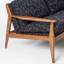 To prevent fading and cracking, avoid exposure to direct sunlight or heat. Mathias Mid Century Wood Frame Sofa
