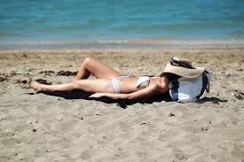 Topless sunbathing on New Zealand beaches- legal aspects and what people think