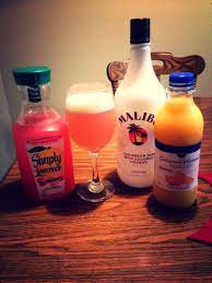 Check spelling or type a new query. Malibu Coconut Rum Raspberry Lemonade Orange Juice Ice And Blend Rum Drinks Yummy Drinks Coconut Rum
