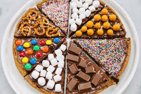 Just stack up your favorite donuts and top with a candle. Candy Topped Chocolate Chip Pizza Recipe Teen Vogue