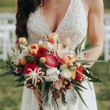 Antique candlestick with wedding bouquet.wedding candlestick with flower decoration before wedding ceremony. Wedding Flowers Aisle Society