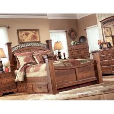 Timberline King Poster Bed With Underbed Storage By Signature Design By Ashley At Furniture Barn King Bedroom Furniture Furniture King Bedroom Sets