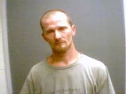 Four men arrested after leading officials