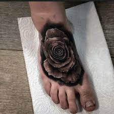 Foot tattoos deigns which are popular among girls and women are animal designs, star designs, tribal designs and bows and ribbons. Realistic Black Rose Foot Tattoos For Men Foot Tattoos Rose Tattoo Foot Rose Tattoos For Women