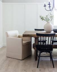 12 slipcovered dining chairs designed