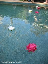 How To Make Floating Flowers For A Swimming Pool Hunker Pool Wedding Pool Wedding Decorations Floating Pool Flowers