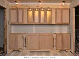 Using a wall cabinet as a base cabinet can be very practical depending on the situation. The Wall Of Cabinets Build Is Finished In Cabinet Lights Installed And Upper Cabinets Heightened To Ceiling Addicted 2 Decorating
