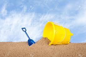 Check spelling or type a new query. A Yellow Plastic Beach Bucket Toy With A Blue Shovel In The Sand During An Outting To The Beach Stock Photo Picture And Royalty Free Image Image 14341507