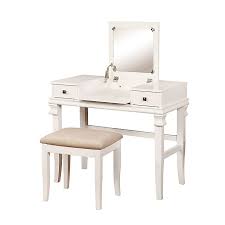 Â enjoysome much needed personal grooming space with this attractive white vanityand stool set.â the vanity features an adjustable mirror generously sizeddrawer. Linon Home Angela 2 Piece Vanity Set Bed Bath Beyond