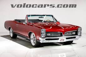 Image result for Rosso Chiaro 1967 AC Cars