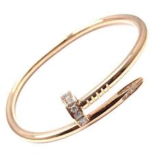 The Best Cartier Dupes On The Market 40k Vs 18 90 Cartier Nail Bracelet Diamond Bracelets Rose Gold Engagement Ring Vintage