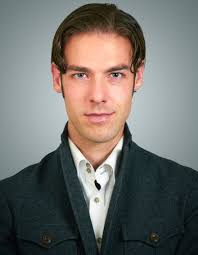 Michael composes himself to pick up the prize