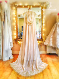 Introducing bhldn's spring 2021 wedding dress collection! Joanne Fleming Design Blush Silk Chiffon Hooded Bridal Cloak With Gold Lace Detailing Evening Gowns Couture Gorgeous Wedding Dress Wedding Dresses Unique