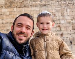 Praying at the Western Wall for birthday wishes