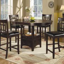 A golden oak finish covers the tabletop and seats, which are. High Top Pub Table And Chairs Ideas On Foter