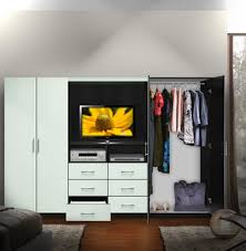 Bar for dad, sewing center for mom, spaceship for brother, play kitchen for sister, diaper changing station for baby. Aventa Tv Wardrobe Wall Unit Free Standing Bedroom Tv Unit Contemporary Bedroom New York By Contempo Space Houzz
