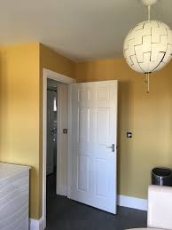 Mustard Color Paint Bedroom With Table In 2020 Living Room Color Yellow Living Room Colors Living Room Colors