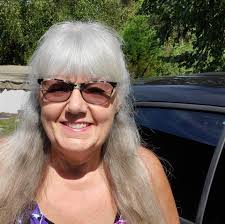 🚨Abigail Spanberger responds to the sign targeted at Winsome Earle-Sears  at the pro-transgender Arlington rally. ⬇️