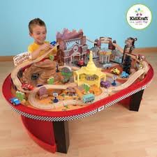 Amazon Com Kidkraft Race Track And Train Table Radiator Disney Cars Motiff Lightning Mcqueen Mater Sally Everything E Cars Room Disney Cars Disney Bedrooms