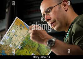 Army Reserve Master Sgt. Frank Flowers, a Logistics Services NCO for the  103rd Sustainment Command (Expeditionary) tries the meal the Army Reserve  Culinary Arts Team made out of a mobile kitchen trailer