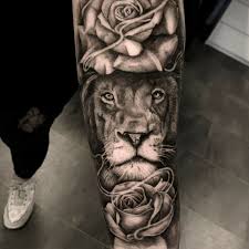 Tribal lion tattoos are most often just the lion's head, roaring or standing guard, and usually in black ink. Tattoo Uploaded By Percy Tat2holics Lion Rose 1541246 Tattoodo