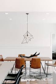 13 White Dining Rooms That Never Go Out Of Style Hunker Mid Century Modern Dining Room Dining Room Chairs Modern Dining Room Industrial