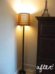 Diy floor lamp bedside table combo ~ how clever is this floor lamp bedside table combination? Torch Lamp Makeover Floor Lamp Makeover Lamp Makeover Lamp