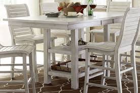 A great example of a distressed farmhouse table, which will add the rustic charm and warmth to every dining or living room. Willow Distressed White Rectangular Counter Height Dining Table From Progressive Furniture Coleman Furniture