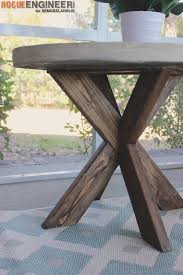 It's easy to create a concrete table top for your patio table. Remodelaholic Build It X Brace Concrete Side Table