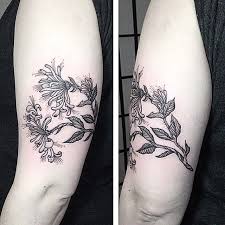 There are an unlimited number of things that a butterfly tattoo on the left shoulder could symbolize. Honeysuckle Tattoo Honeysuckle Tattoo Tattoos Calla Lily Tattoos