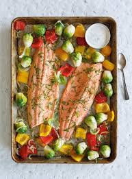 Truite Au Four Et Legumes Rotis Au Basilic Ricardo Recipe Baked Trout Trout Recipes Roasted Vegetables