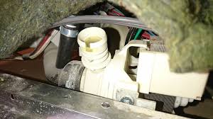 If the garbage disposer wasn't replaced recently, it is possible that the disposer is clogged. Plumbing Hooking Aftermarket Drain Hose To Frigidaire Dishwasher Itectec