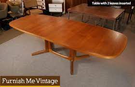 This is a 2,000 tabl Danish Modern Teak Dining Table Niels Moller Gudme