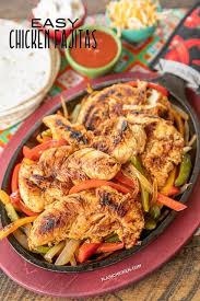 The method involves quickly searing the meat on a griddle or grill, and then slicing and serving with quickly seared peppers and onions. Easy Chicken Fajitas Plain Chicken