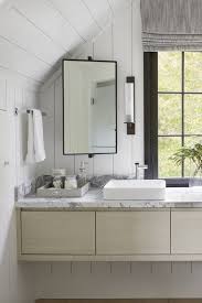 Exploring The Frontiers Of Design In Cape Cod Kohler Ideas In 2020 Booth Design Bathroom Lighting Design Vanity