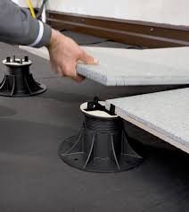 The Self Levelling Heads Of The Eterno Ivica Pedestals Make Creating A Level Raised Patio Easy Raised Patio Stone Deck Balcony Tiles