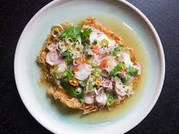 Dig Into This Thai Salad Of Crispy Runny Fried Eggs With Fresh Herbs Aromatics And A Sour Spicy Dressing In 2020 Cooking Jasmine Rice Egg Salad Recipe Serious Eats