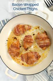 Crispy Bacon Is Wrapped Around Seasoned Chicken Thighs To Create An Easy To Prepare Keto Meal That The Crispy Bacon Chicken Thigh Recipes Bacon Wrapped Chicken