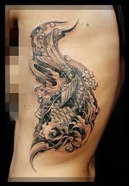 Koi Fish Tattoo On The Ribs Chronic Ink Tattoos Tattoos Body Art Tattoos Water Tattoo