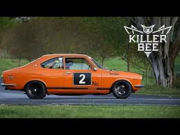 Image result for Hailey Orange 1966 Mazda