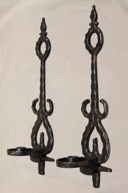 This is a spectacular pair of italian hand painted tole metal grapevine candle holder wall sconces. Black Metal Wall Sconce Candle Holder Paulbabbitt Com