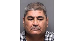 Robbery suspect arrested after homeowner slashes his car tires with machete