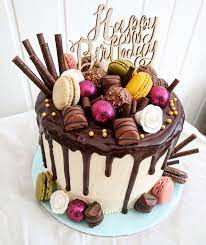 A stunning children's birthday chocolate cake with hidden treasure buried on a sandy desert island for the kids to dig into. Pin On Birthday Cake