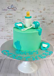 Beautiful Baby Cake We Created This Gorgeous Chocolate Mud Baby Shower Cake This Week Covered In Buttercream And Finish Baby Cake Cake Baby Shower Cake Topper